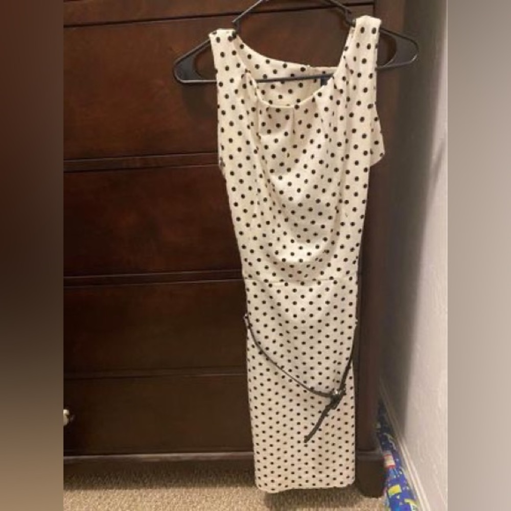 Comfy, polka dot dress with trendy belt that provides nice look around waist.